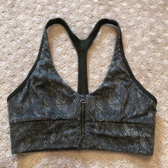 Lululemon dark green patterned sports bra. Front zip up. Size 4.